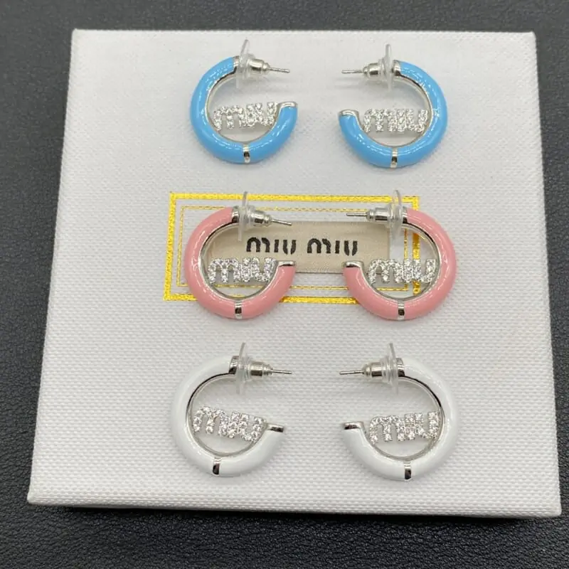 miu miu boucles doreilles pour femme s_12130342